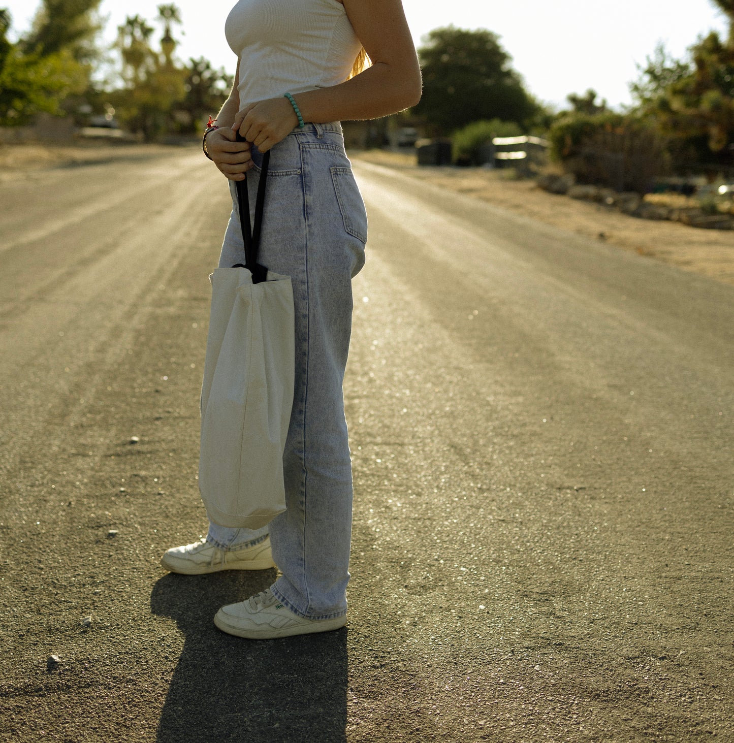 Each Bag Has Been Custom Designed. Every Bag is Sewn by Hand and Made In The USA from Recycled Cotton and Recycled Plastic Bottles.  13-inch handle allows you to easily carry your bag by hand.