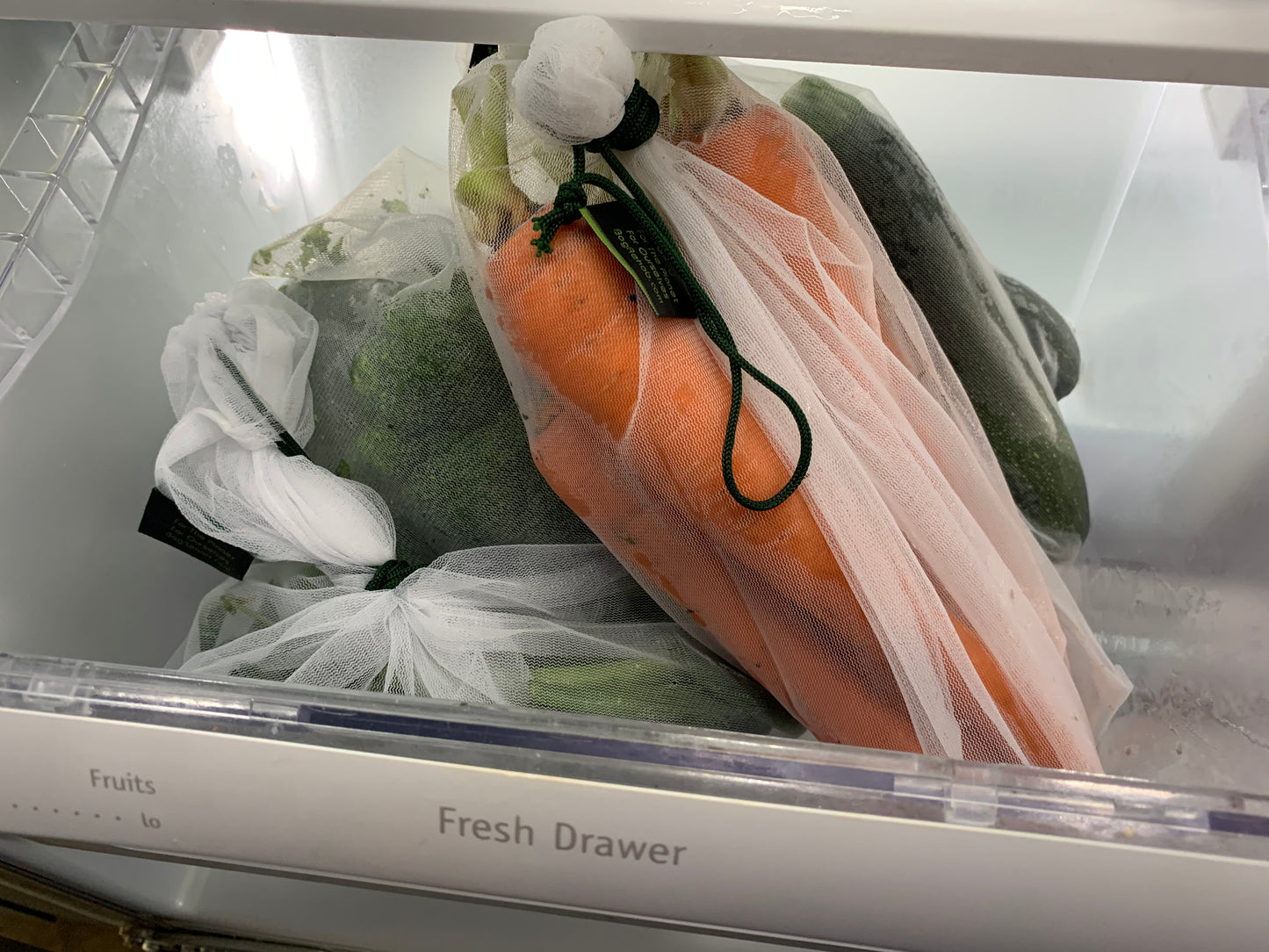 One Size to fit ALL your veggies and STOP SINGLE USE PLASTIC BAG WASTE. Made with Fine Mesh. Can Wash Your Produce and Store Veggies Right In The Bag! Machine Washable Produce Bag. Durable. Eco-Friendly. Light-Weight. Veggies Can Be Stored In Their Bags In The Fridge!